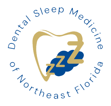 The image is a logo for the  Sleep Medicine of Northeast Florida.  It features a stylized graphic of a sleep mask, symbolizing sleep medicine, and includes text that reads  Dental Sleep Medicine  and  Northeast Florida,  indicating the name of the organization and its location.